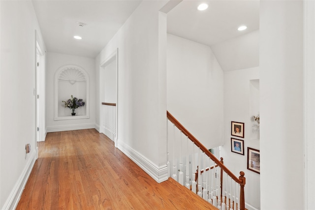 61 Carolyn Pl, Chappaqua, NY 10514 - hallway featuring an upstairs landing, wood finished floors, recessed lighting, and baseboards