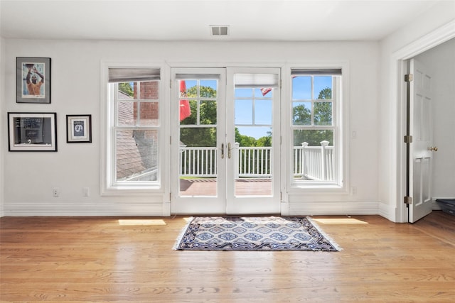 61 Carolyn Pl, Chappaqua, NY 10514 - doorway to outside featuring baseboards, french doors, and wood finished floors