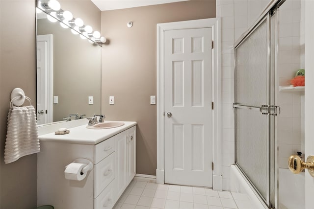 61 Carolyn Pl, Chappaqua, NY 10514 - full bath with vanity, tile patterned floors, and shower / bath combination with glass door