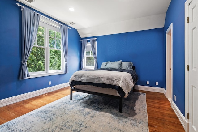 61 Carolyn Pl, Chappaqua, NY 10514 - bedroom featuring lofted ceiling, baseboards, and wood finished floors