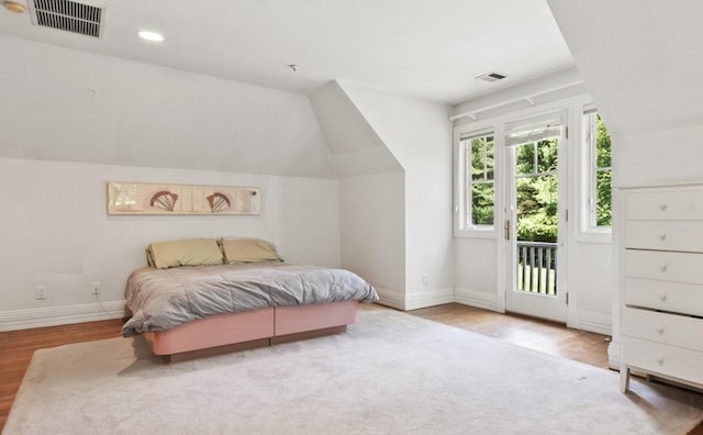 61 Carolyn Pl, Chappaqua, NY 10514 - bedroom featuring access to exterior, wood finished floors, baseboards, vaulted ceiling, and recessed lighting