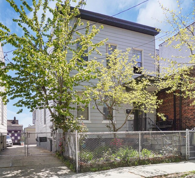 1528 Mayflower Ave, Bronx, NY 10461 - view of property exterior featuring a gate and a fenced front yard