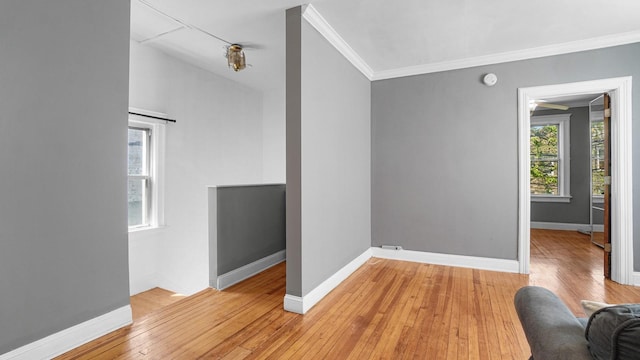 1528 Mayflower Ave, Bronx, NY 10461 - empty room featuring crown molding, light wood-style flooring, and baseboards