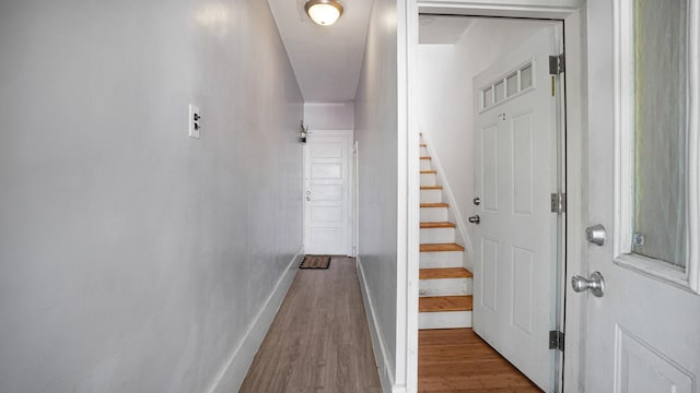 1528 Mayflower Ave, Bronx, NY 10461 - hallway featuring wood finished floors, stairs, and baseboards