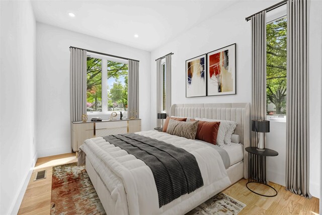 76-17 162nd St, Fresh Meadows, NY 11366 - bedroom featuring light wood finished floors, recessed lighting, and baseboards