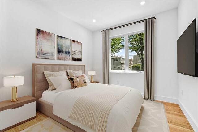 76-17 162nd St, Fresh Meadows, NY 11366 - bedroom featuring light wood-style flooring, recessed lighting, and baseboards