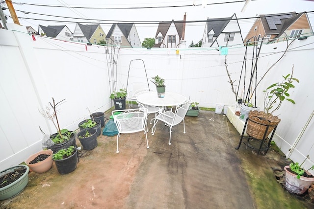 165 Page Rd, Valley Stream, NY 11581 - fenced backyard with a patio and outdoor dining space