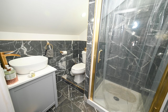 165 Page Rd, Valley Stream, NY 11581 - bathroom featuring a stall shower, marble tiled floors, vanity, toilet, and tile walls