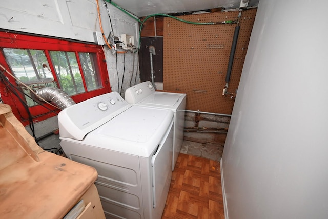 165 Page Rd, Valley Stream, NY 11581 - laundry room featuring washing machine and dryer and cabinet space