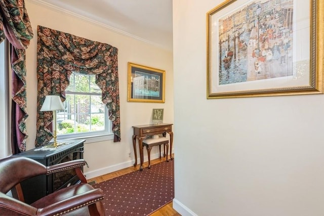 329 Brower Ave, Rockville Centre, NY 11570 - hall with crown molding, baseboards, and wood finished floors