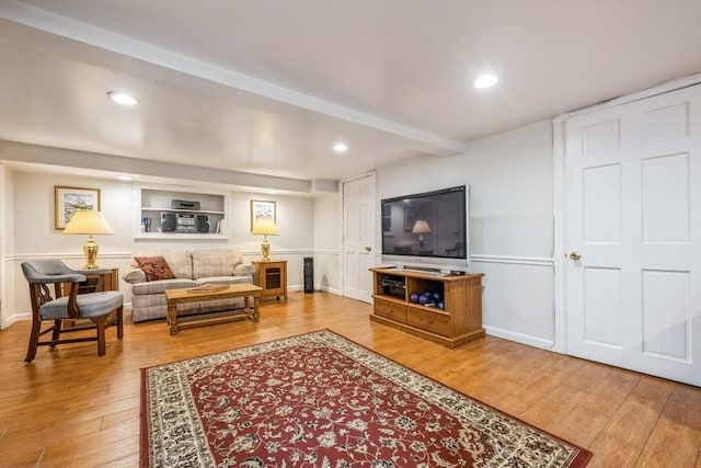 329 Brower Ave, Rockville Centre, NY 11570 - living area featuring hardwood / wood-style flooring and recessed lighting