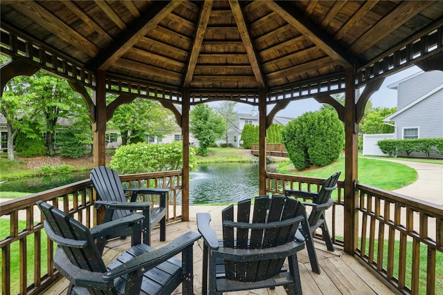 124 Pond View Dr Unit 317, Port Washington, NY 11050 - deck with a gazebo, a water view, and a lawn