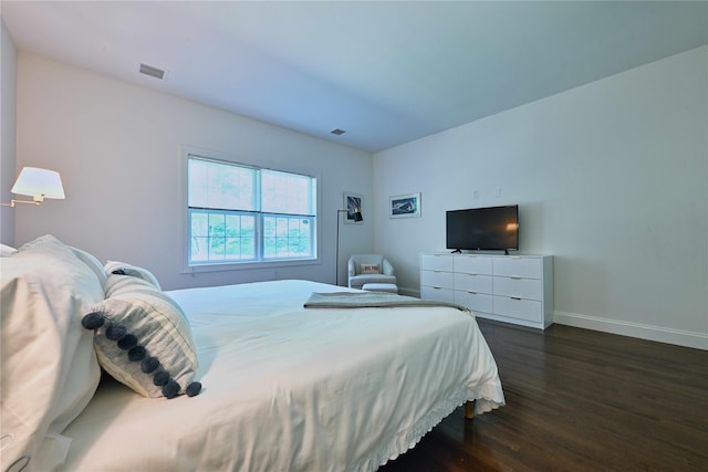 124 Pond View Dr Unit 317, Port Washington, NY 11050 - bedroom with dark wood-type flooring and baseboards