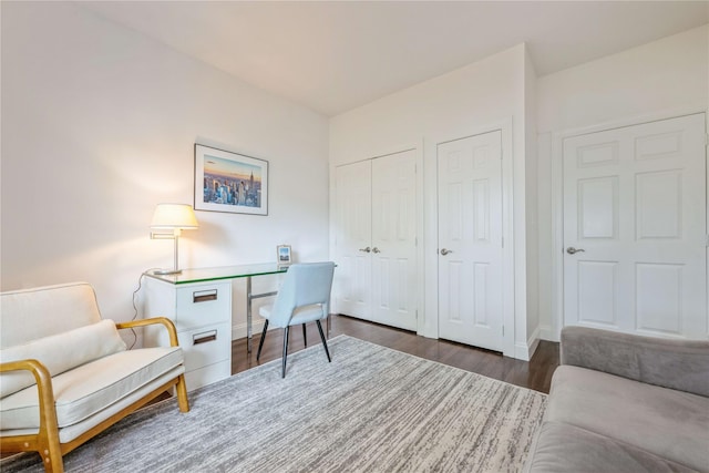 124 Pond View Dr Unit 317, Port Washington, NY 11050 - home office featuring wood finished floors and baseboards