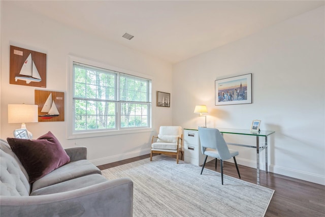 124 Pond View Dr Unit 317, Port Washington, NY 11050 - office area with baseboards and wood finished floors