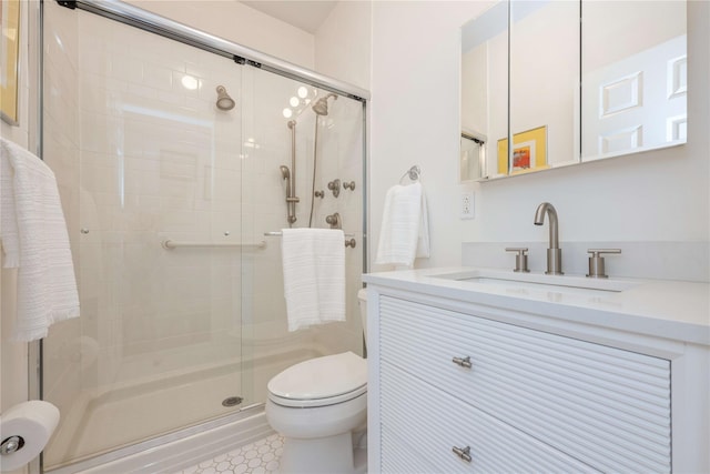 124 Pond View Dr Unit 317, Port Washington, NY 11050 - full bathroom with toilet, a shower stall, vanity, and tile patterned floors