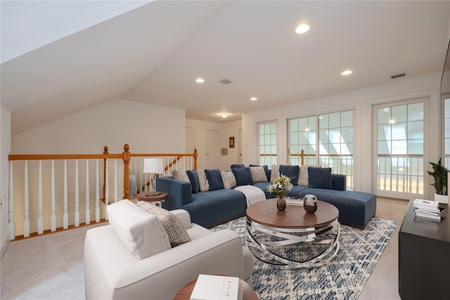 124 Pond View Dr Unit 317, Port Washington, NY 11050 - living area with recessed lighting, vaulted ceiling, plenty of natural light, and light colored carpet