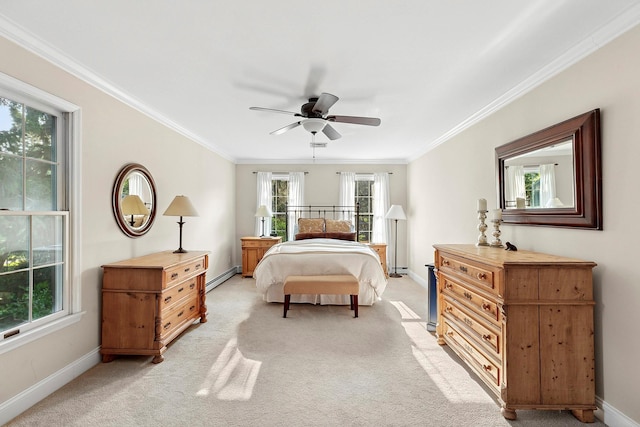 38 Maple Ave, Northport, NY 11768 - bedroom featuring a baseboard heating unit, light carpet, baseboards, ornamental molding, and ceiling fan