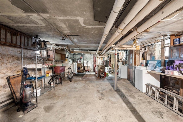 243 E 234th St, Bronx, NY 10470 - unfinished below grade area with washing machine and dryer and a workshop area