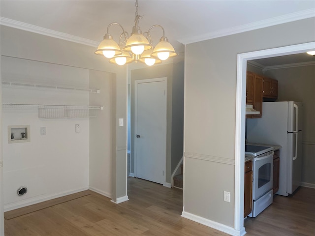 122 Oak Park Ter, Wappingers Falls, NY 12590 - washroom featuring a chandelier, light wood-type flooring, crown molding, baseboards, and hookup for a washing machine