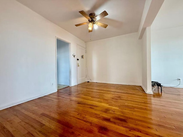 38-15 149th St Unit 6S, Flushing, NY 11354 - empty room with a ceiling fan, wood finished floors, and baseboards