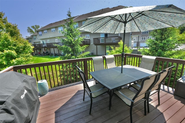 2 Hidden Creek Blvd, Monroe, NY 10950 - wooden terrace featuring grilling area, outdoor dining space, a residential view, and a yard