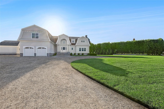 44 Club Ln, Remsenburg, NY 11960 - view of front of house featuring a gambrel roof, driveway, an attached garage, and a front yard