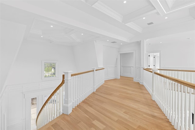 44 Club Ln, Remsenburg, NY 11960 - hall featuring an upstairs landing, coffered ceiling, beam ceiling, recessed lighting, and a decorative wall