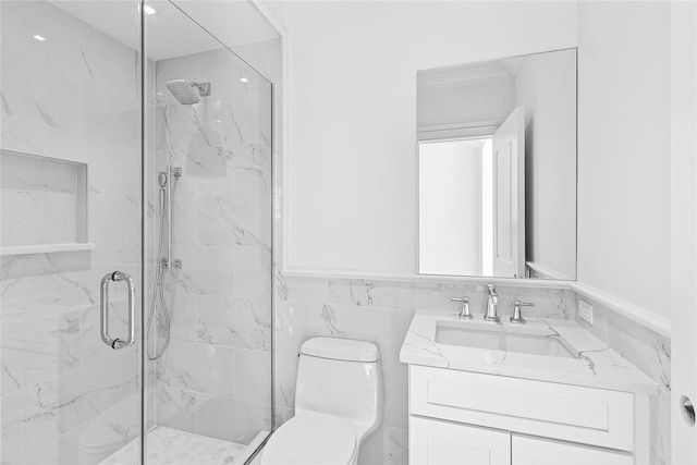 44 Club Ln, Remsenburg, NY 11960 - bathroom with a marble finish shower, toilet, vanity, wainscoting, and tile walls