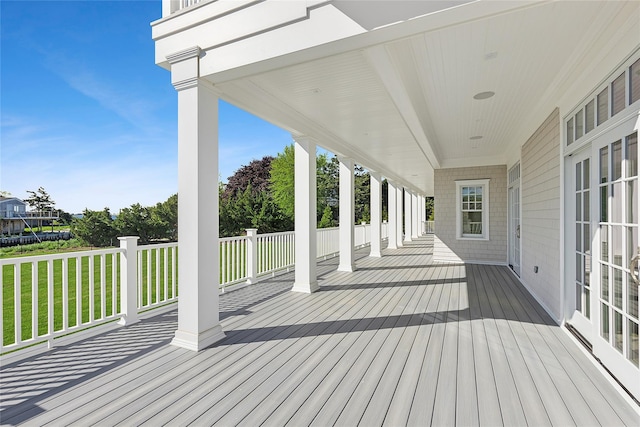 44 Club Ln, Remsenburg, NY 11960 - deck featuring a lawn