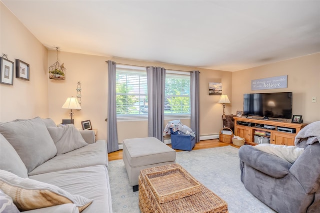 58 Hooper St, Port Jefferson Station, NY 11776 - living room with light wood-type flooring and baseboard heating