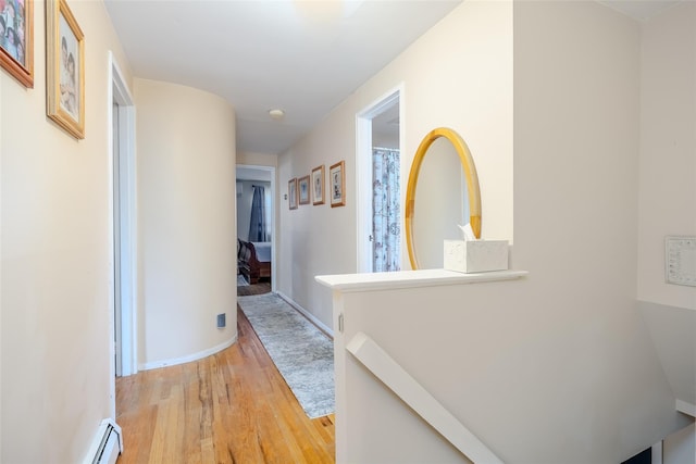 58 Hooper St, Port Jefferson Station, NY 11776 - hallway with light wood-style flooring and baseboards