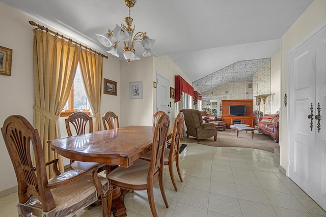 116 Intervale Ave, Farmingdale, NY 11735 - dining room with plenty of natural light, a chandelier, lofted ceiling, and light carpet