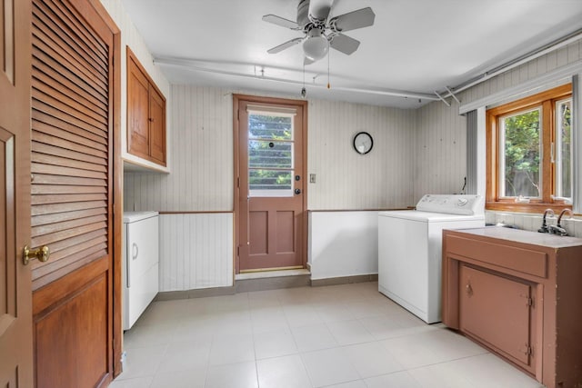 116 Intervale Ave, Farmingdale, NY 11735 - laundry room featuring washer / clothes dryer, cabinet space, and plenty of natural light