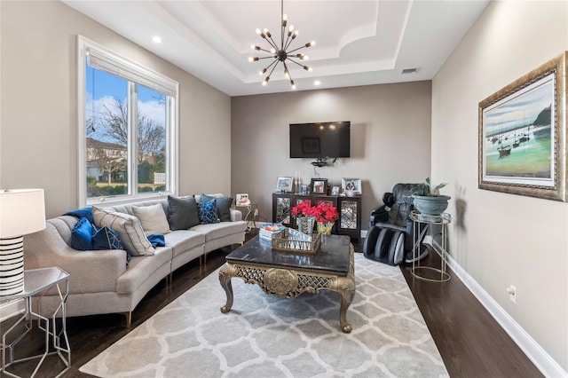 2854 Whaleneck Dr, Merrick, NY 11566 - living room featuring wood finished floors, a chandelier, baseboards, recessed lighting, and a raised ceiling