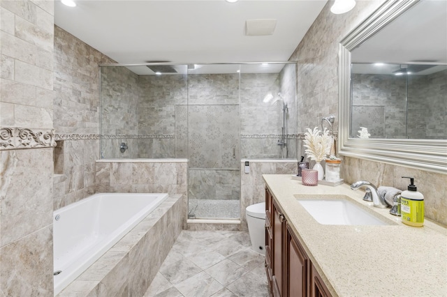 2854 Whaleneck Dr, Merrick, NY 11566 - bathroom with tile walls, a bath, vanity, a stall shower, and toilet