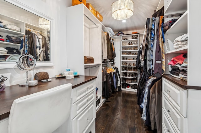 2854 Whaleneck Dr, Merrick, NY 11566 - walk in closet with dark wood-style floors and a chandelier