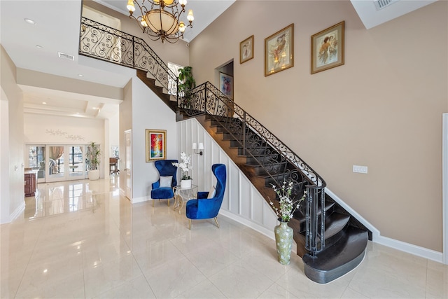 2854 Whaleneck Dr, Merrick, NY 11566 - stairway with baseboards, a chandelier, a towering ceiling, and recessed lighting