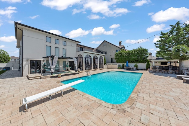 2854 Whaleneck Dr, Merrick, NY 11566 - view of pool featuring a patio, a diving board, and a fenced backyard