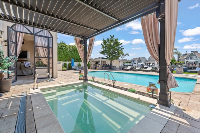 2854 Whaleneck Dr, Merrick, NY 11566 - outdoor pool featuring an outdoor hot tub, a patio, and a residential view