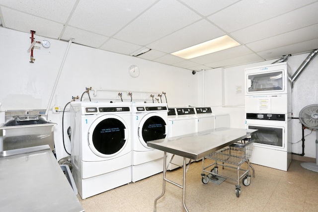 311 71st St E Unit 10A, New York Manhattan, NY 10021 - community laundry featuring independent washer and dryer, stacked washer / dryer, and light floors