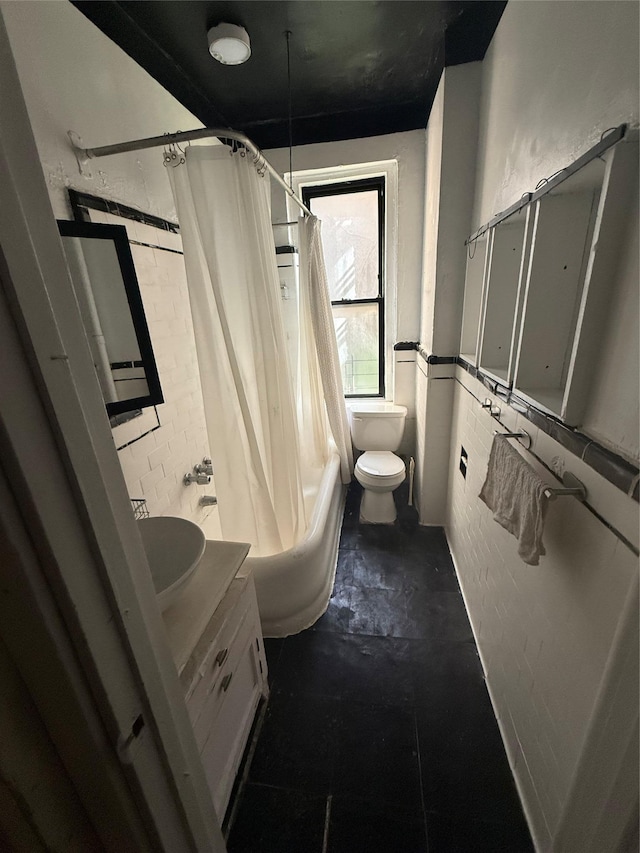 1177 Anderson Ave Unit 2B, Bronx, NY 10452 - full bathroom with toilet, vanity, shower / bath combo, and unfinished concrete floors