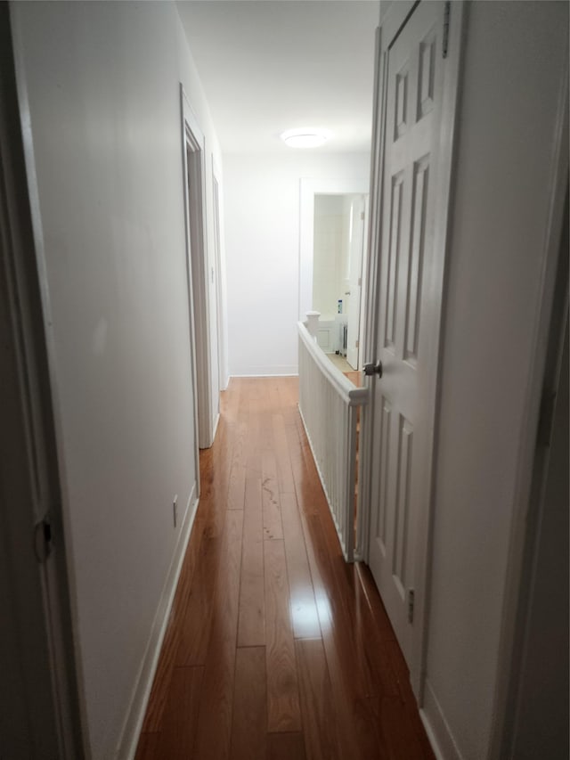 88-38 201st St, Hollis, NY 11423 - hallway with hardwood / wood-style floors and baseboards