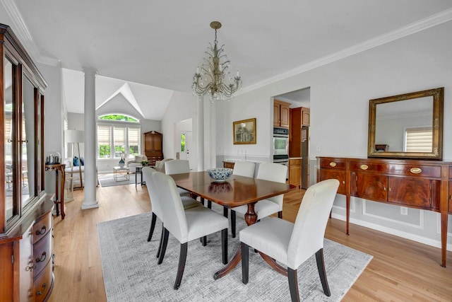 3 Vista Dr, Baldwin Place, NY 10505 - dining area with light wood finished floors, a chandelier, ornamental molding, and decorative columns