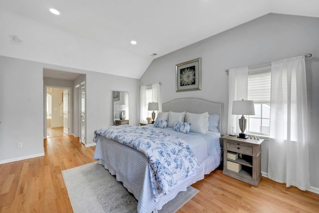 3 Vista Dr, Baldwin Place, NY 10505 - bedroom with lofted ceiling, multiple windows, light wood-type flooring, recessed lighting, and ensuite bathroom