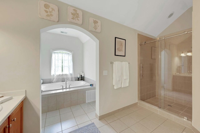 3 Vista Dr, Baldwin Place, NY 10505 - full bathroom with tile patterned flooring, vanity, a garden tub, a stall shower, and vaulted ceiling