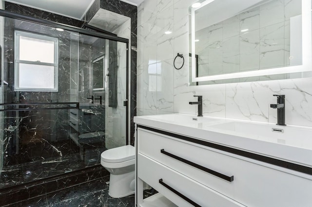 1541 Midian St, North Merrick, NY 11566 - full bathroom with marble finish floors, toilet, double vanity, and a marble finish shower