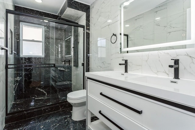 1541 Midian St, North Merrick, NY 11566 - full bath featuring marble tiled flooring, toilet, double vanity, and a marble finish shower