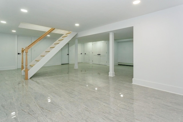 1541 Midian St, North Merrick, NY 11566 - finished basement with stairs, recessed lighting, baseboard heating, and baseboards