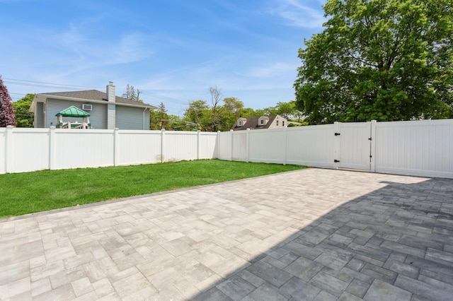 1541 Midian St, North Merrick, NY 11566 - view of patio featuring a gate